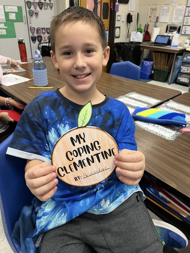 4th Grader with coping clementine (1)