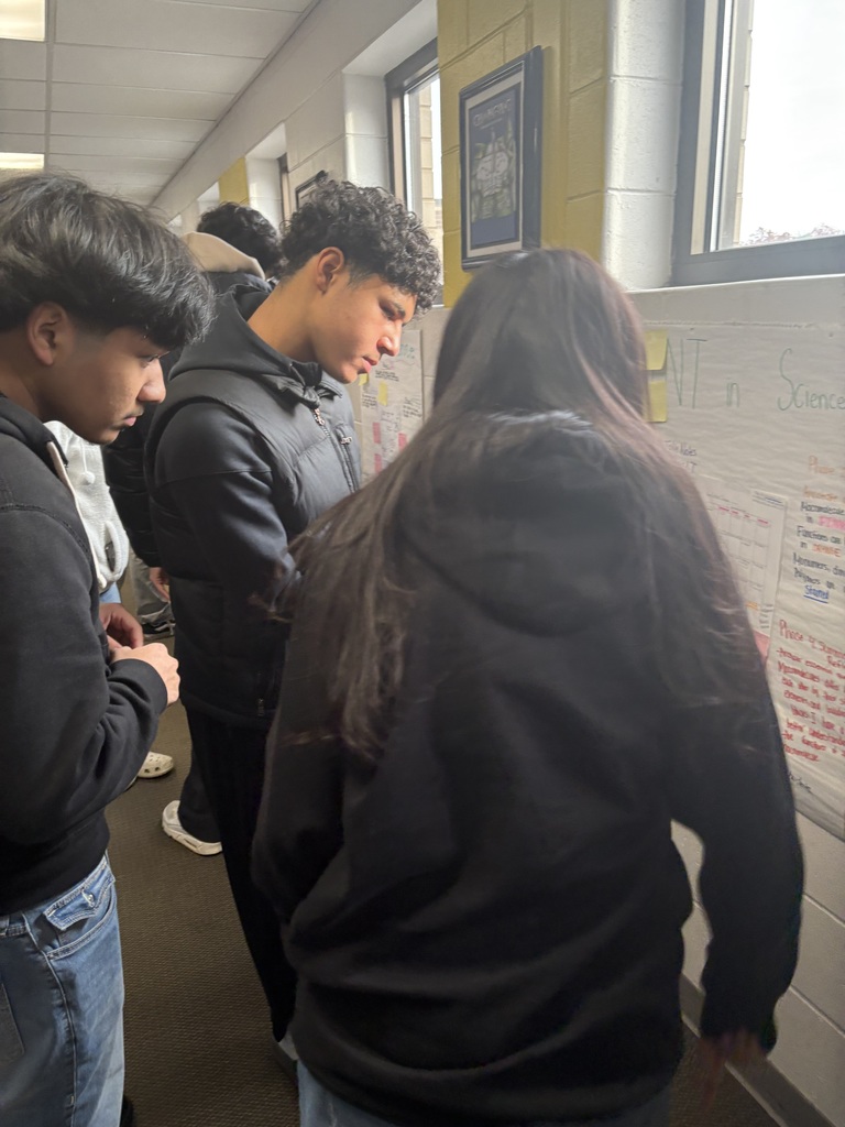 AVID 11 students working on a Focused Note Taking activity