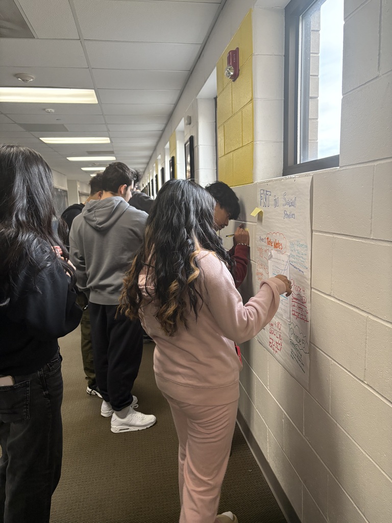 AVID 11 students working on a Focused Note Taking activity