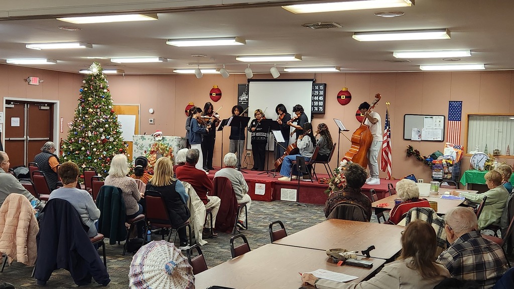NBTHS Select Strings bringing some holiday cheer to the Senior Center