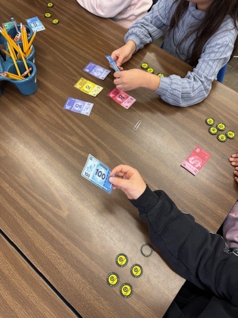 Students purchasing stock
