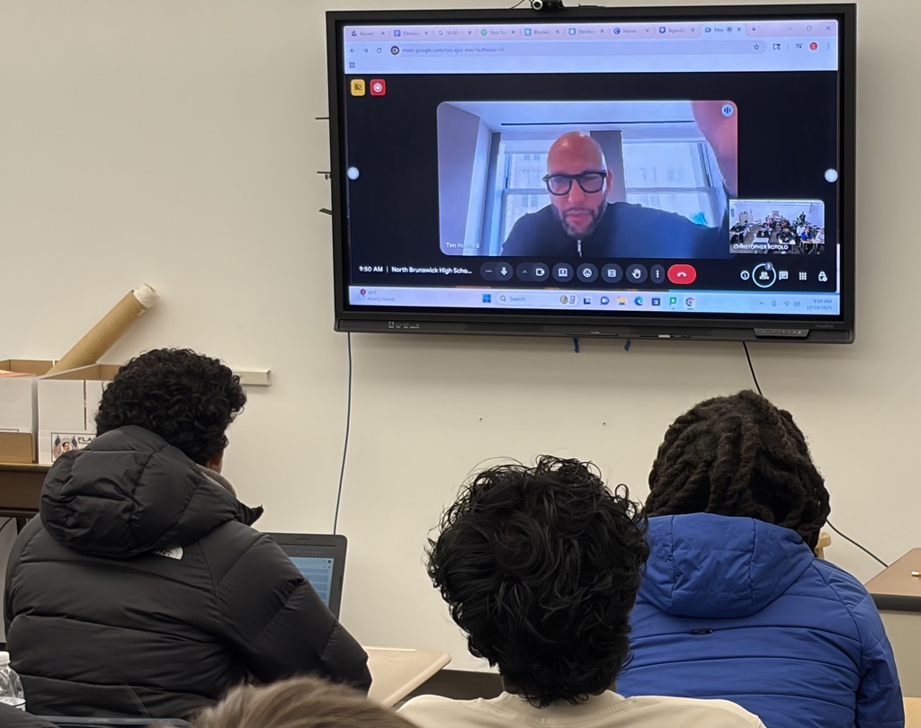 NBTHS Mass and Social Media students pose with Mr. Tim Howard following their interview with the former professional soccer star.