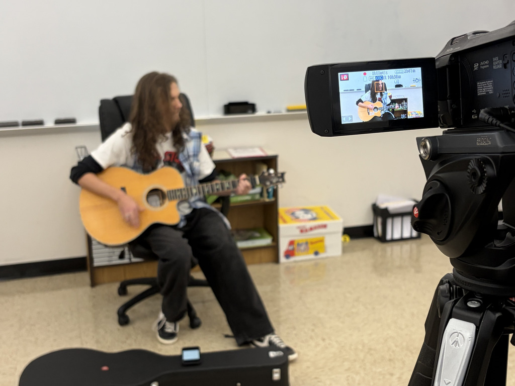 NBTHS Mass and Social Media students film a new music web series in a classroom with local musicians. 