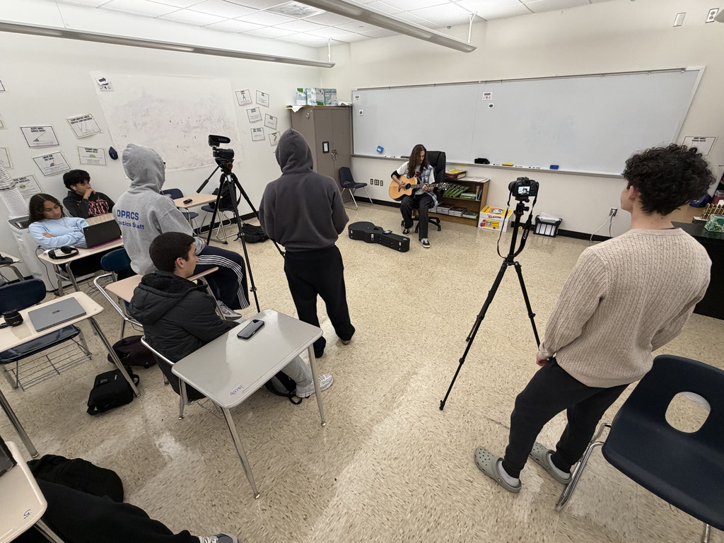 NBTHS Mass and Social Media students film a new music web series in a classroom with local musicians. 