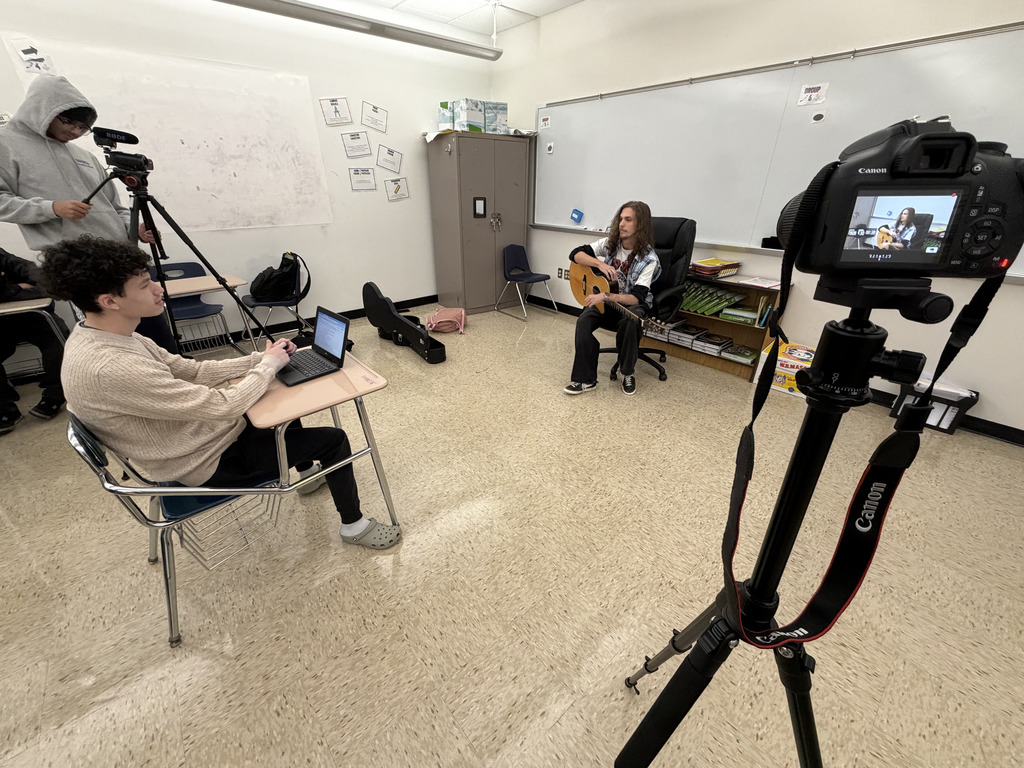NBTHS Mass and Social Media students film a new music web series in a classroom with local musicians. 