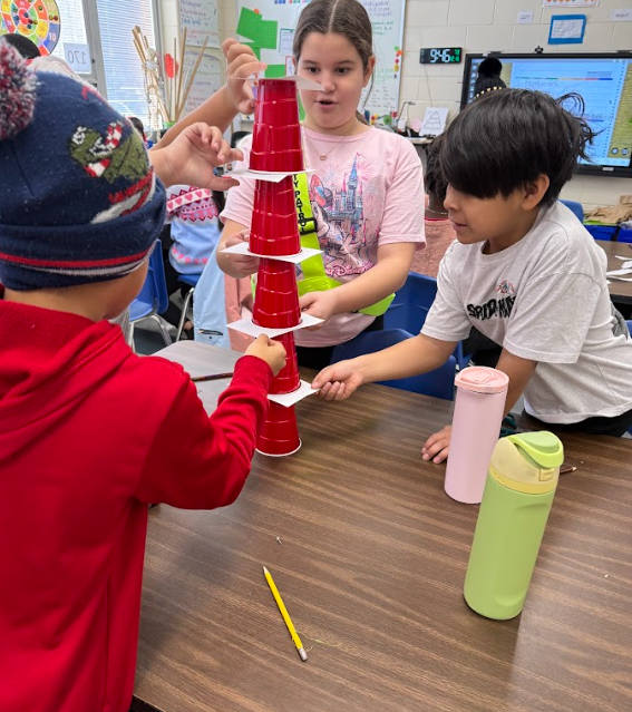 Students building towers
