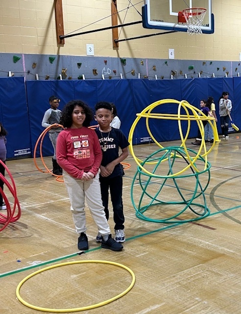 Working with friends to build an igloo or giant snowman.