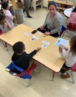Small group of students working on an SEL lesson 