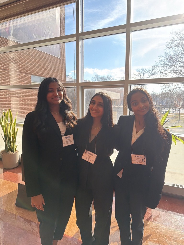 Students supporting each other before their presentations