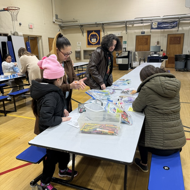 people assembling bags