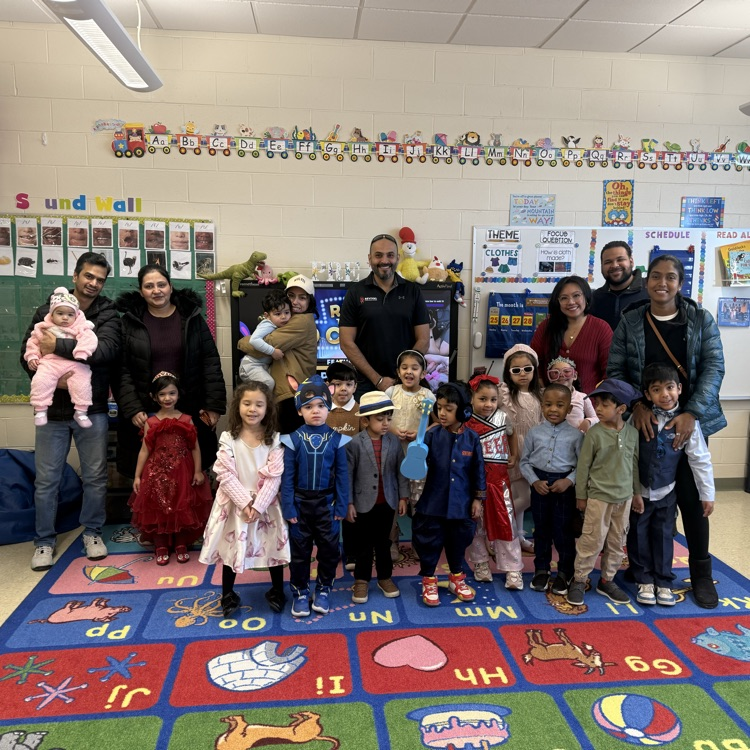Group of preschool students with their parents