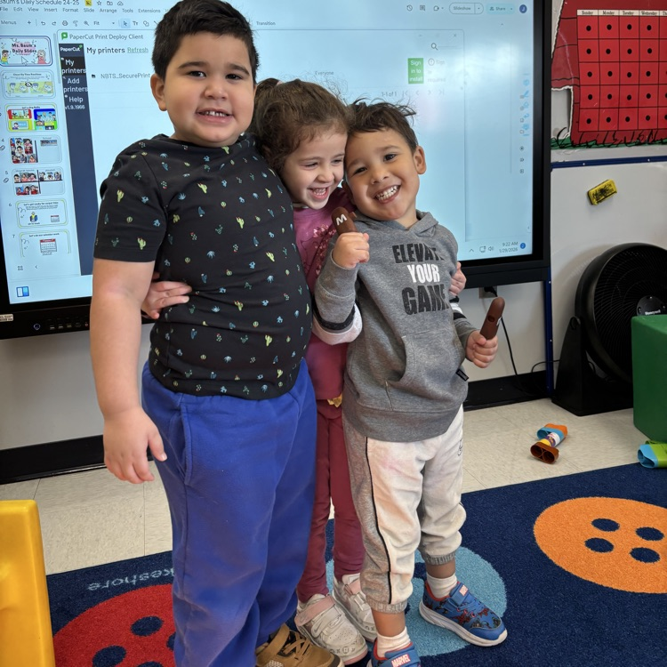 Three students standing together! 