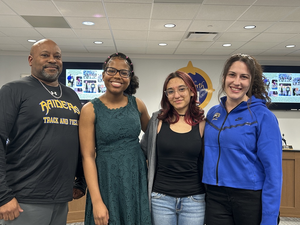 Students and teachers standing together