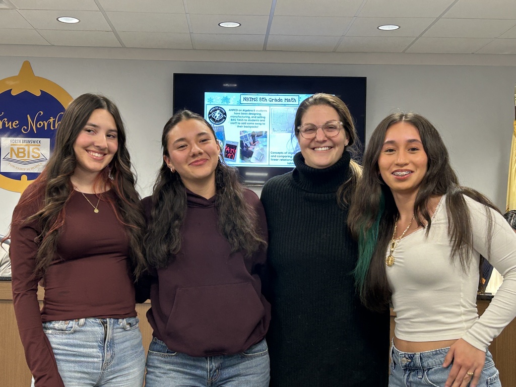 Students and teacher standing together