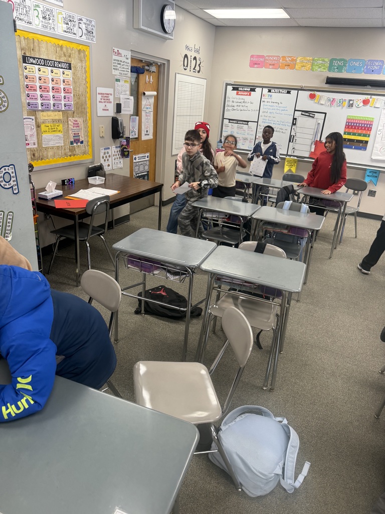 Group of students excited in the classroom
