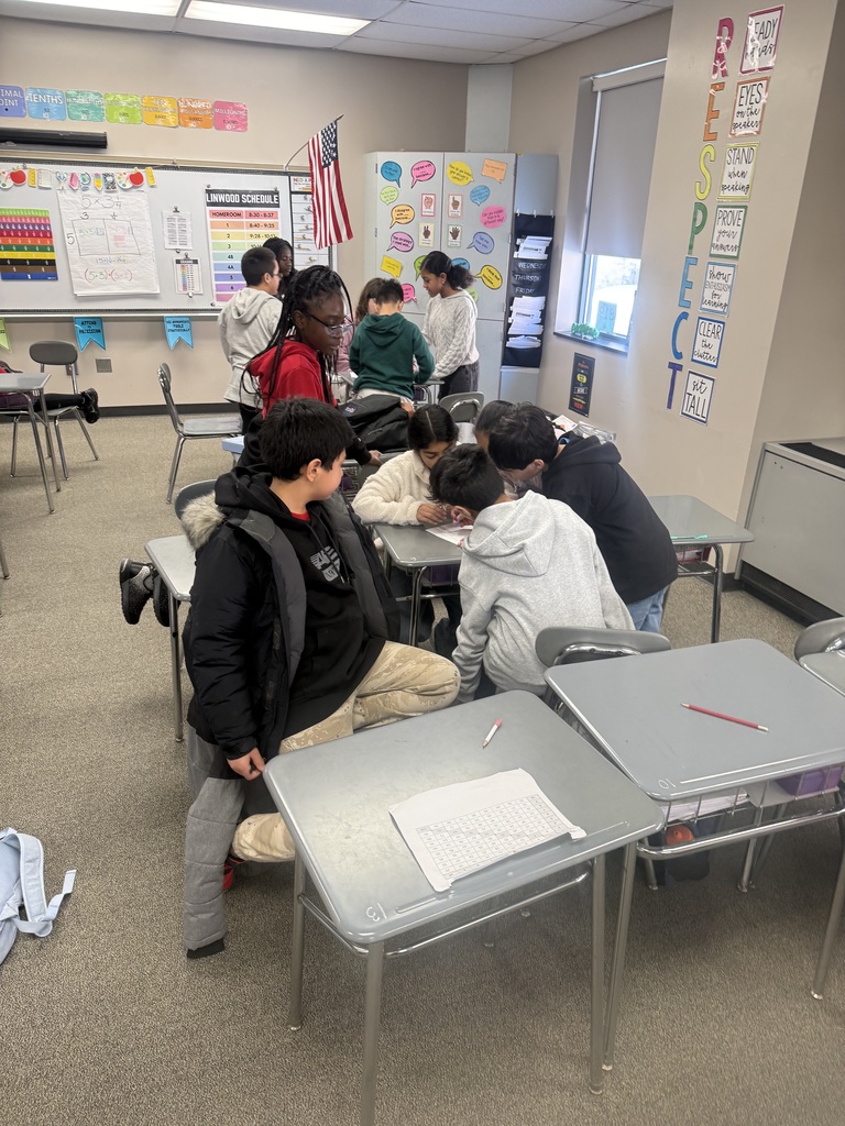 Group of students working together at desks