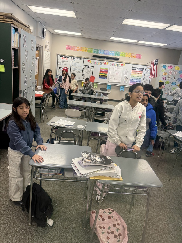 Group of students excited in the classroom