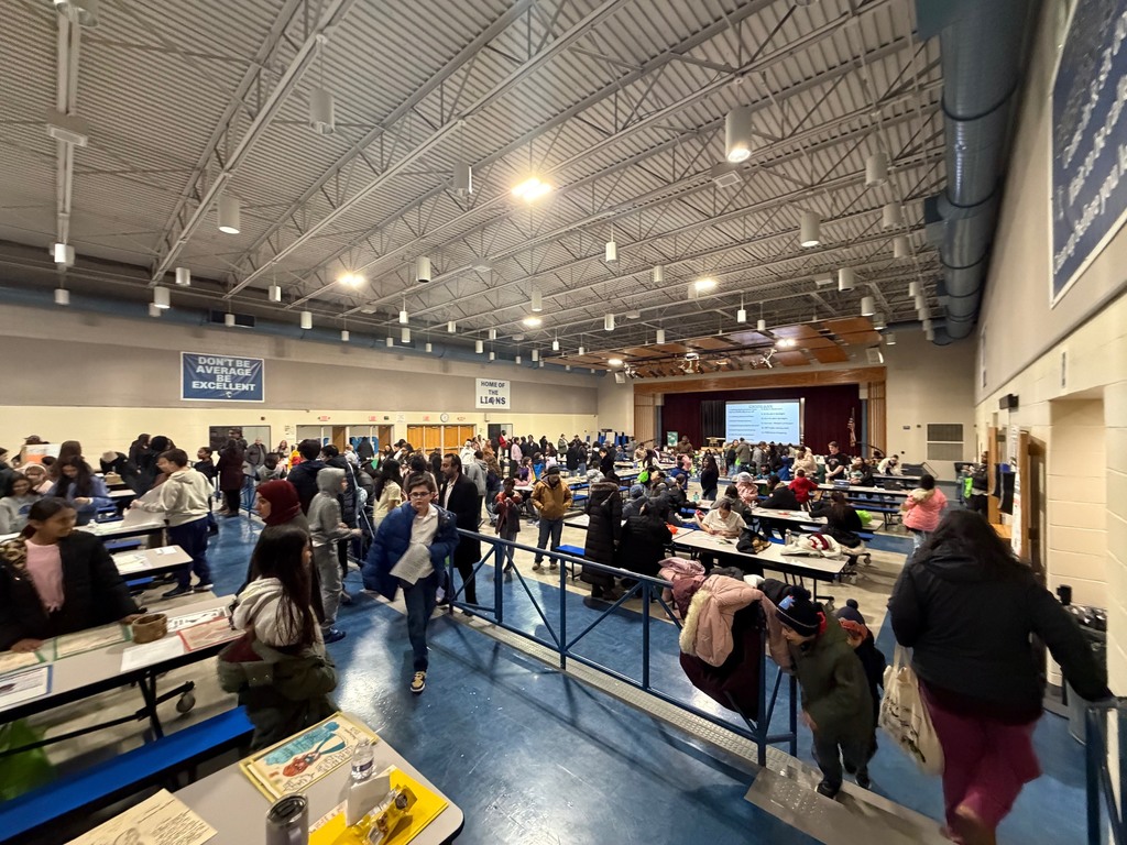 People walking around in a cafeteria