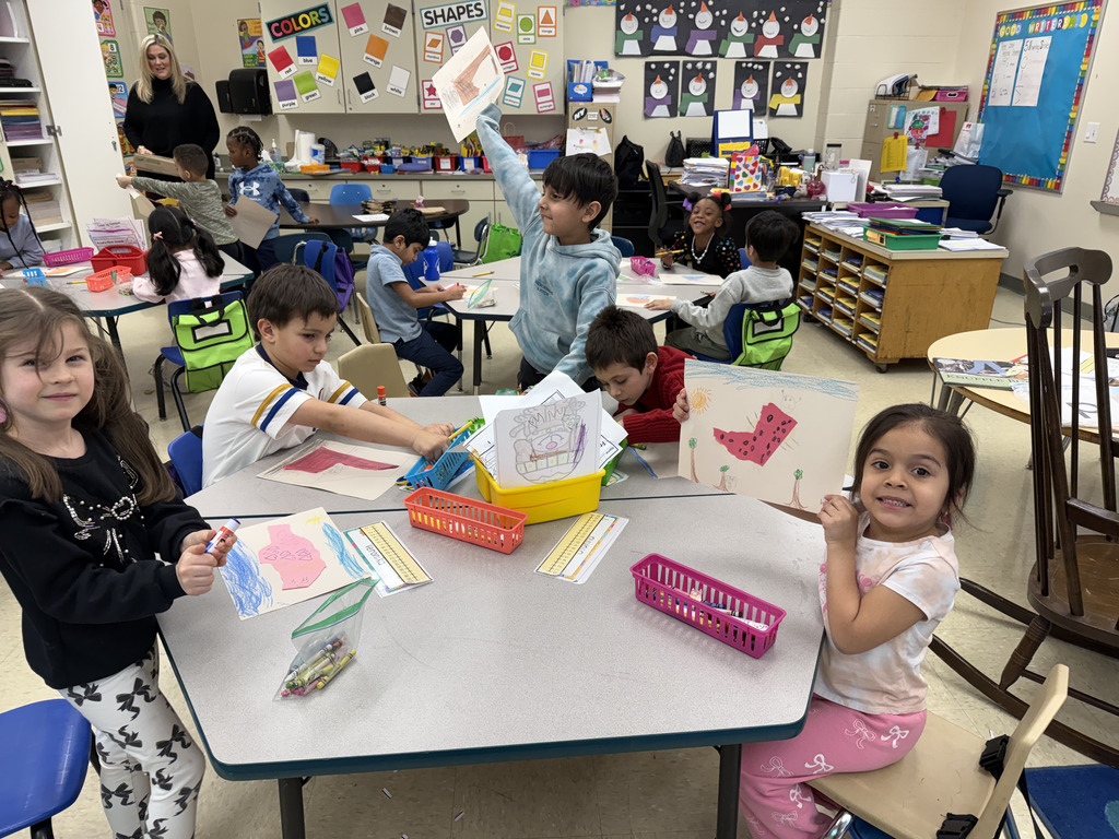 LP Kindergarten students turning scrap paper into art after reading Beautiful Oops!