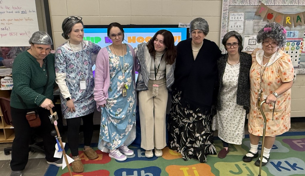Group of teachers dressed up as 100 year olds