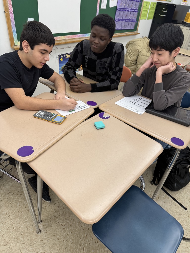 Students working math puzzles