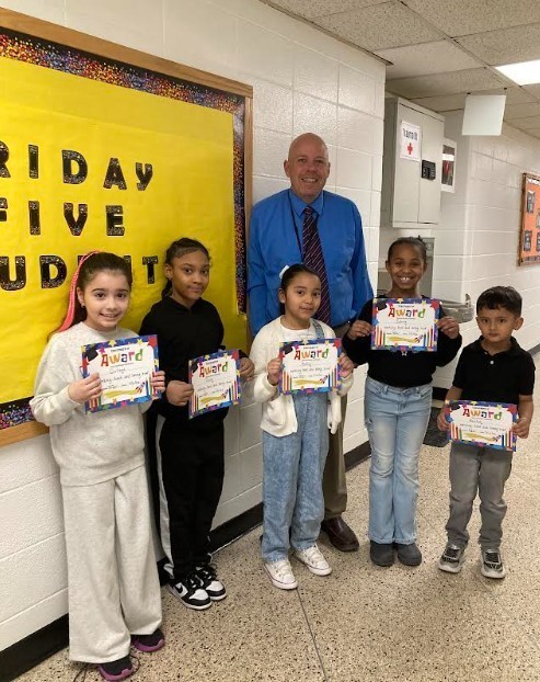 Friday Five 2/27/26 Group of students holding certificates