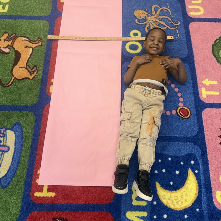 Student laying on the floor