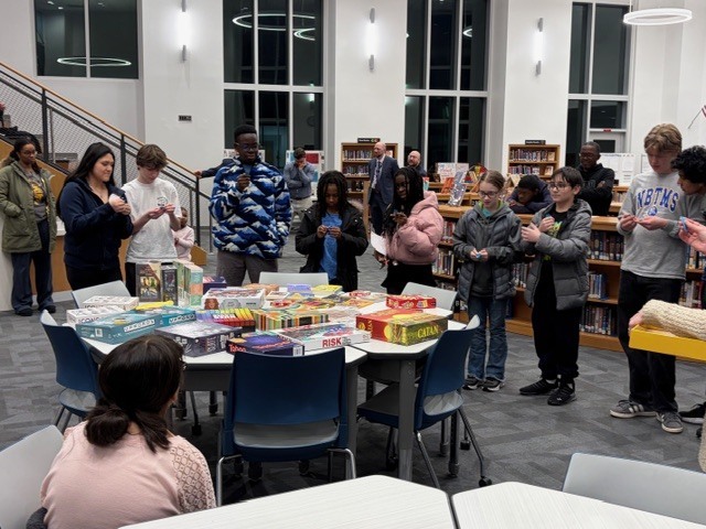 Students presenting to their families