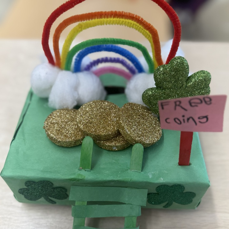 Student posing with Leprechaun Trap Family Project ☘️🌈
