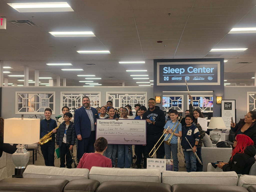 Linwood Honor Band students receive donation.