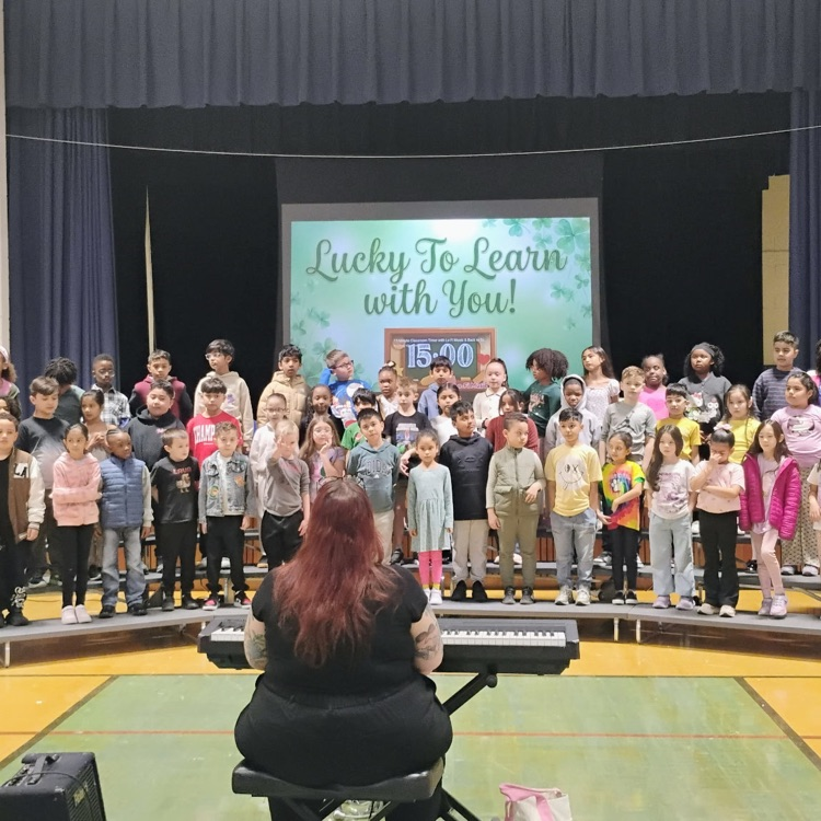 Music Teacher, Ms. Fackelman organized songs for the students to perform! 