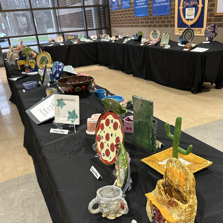 Display of ceramic art pieces on table