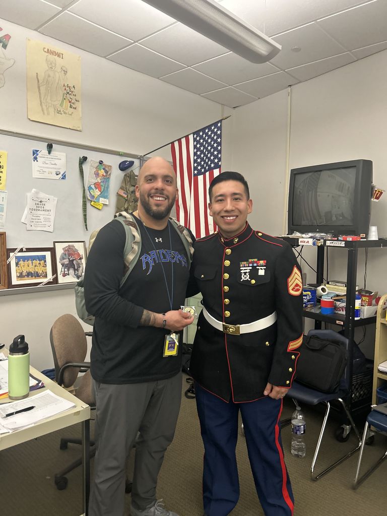 Sgt. Solano with a fellow Marine - Social Studies teacher Mr. Alex Diaz