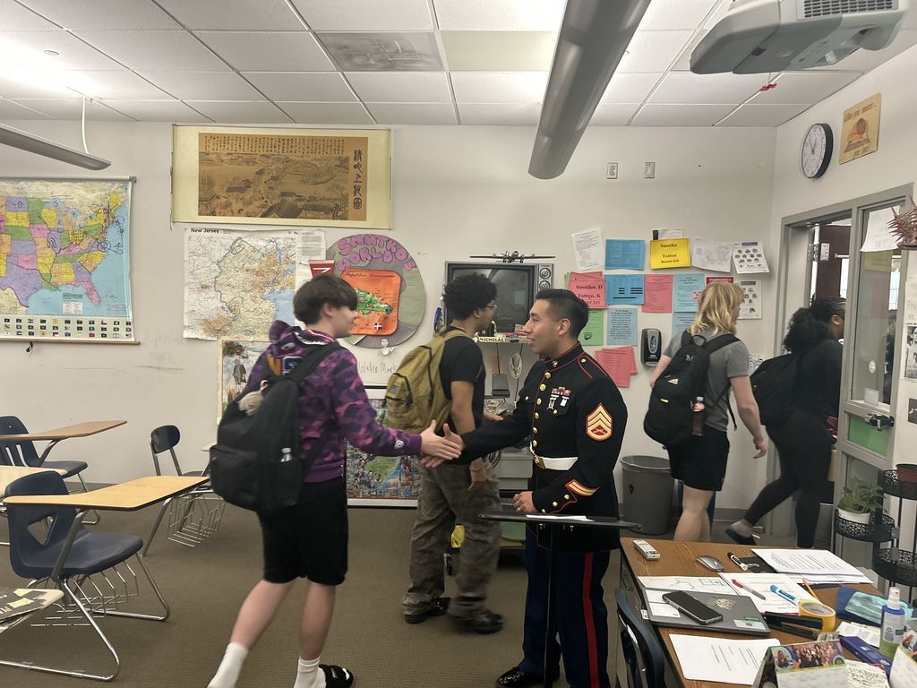 Sgt. Solano of the US Marines visits AMH class at NBTHS