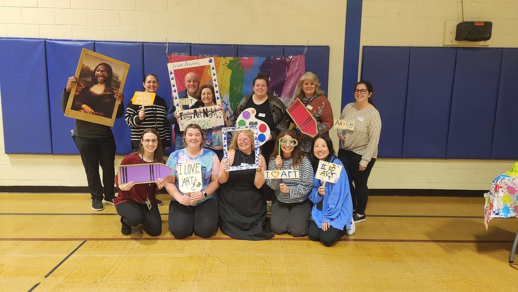 Staff posing together