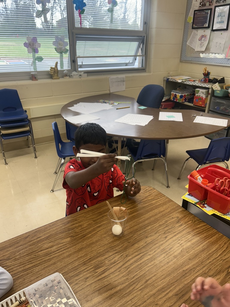 students doing a science activity to explore push and pull forces