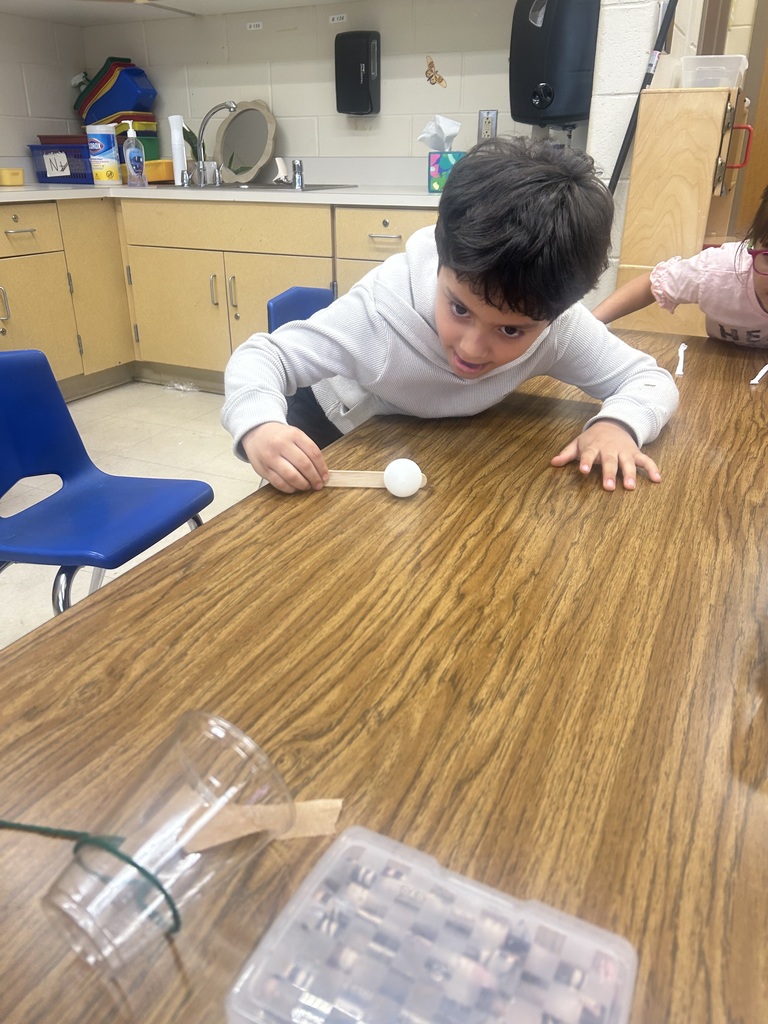 students doing a science activity to explore push and pull forces