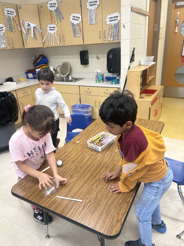 students doing a science activity to explore push and pull forces