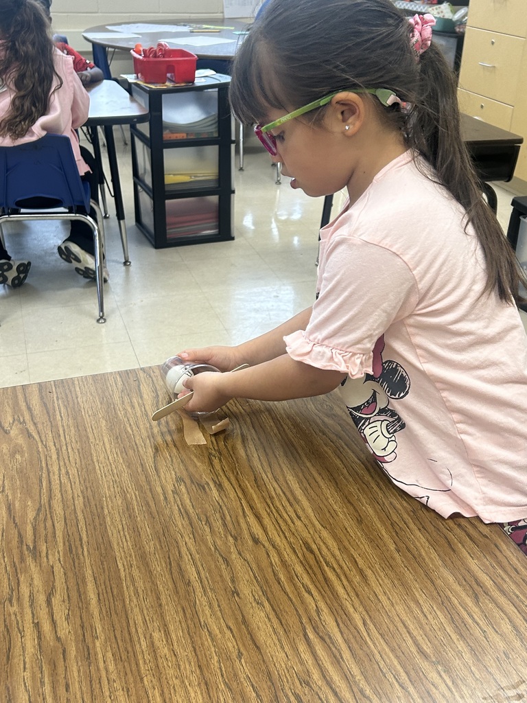 students doing a science activity to explore push and pull forces