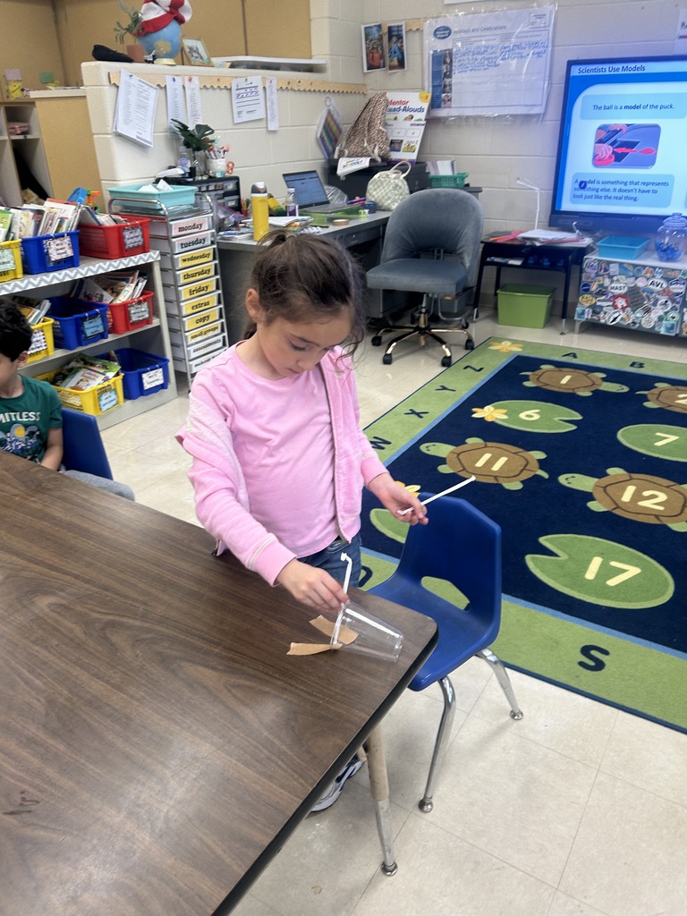 students doing a science activity to explore push and pull forces