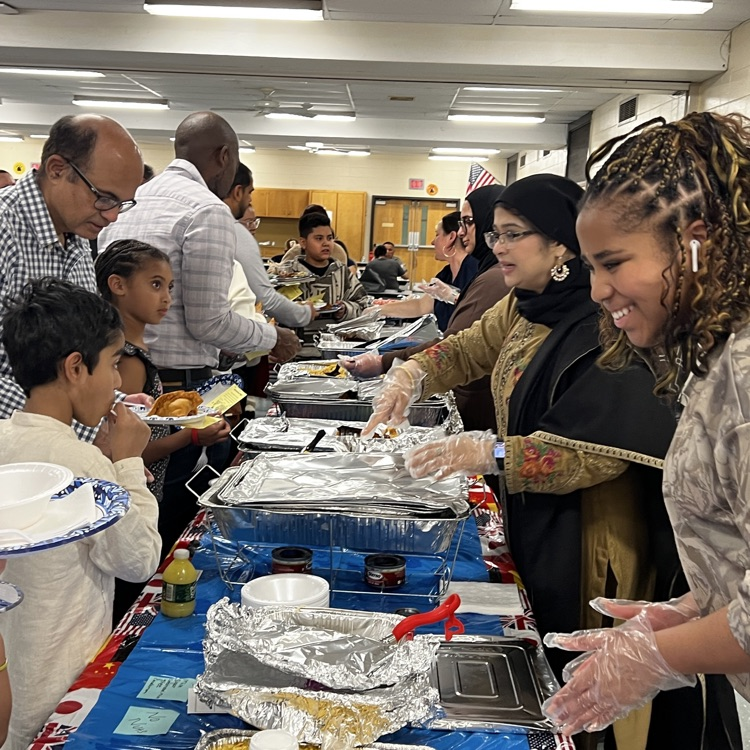 Families getting food at International Night