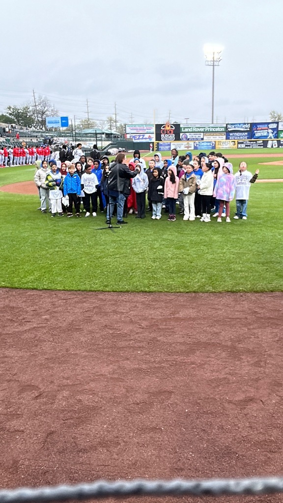Students Singing the national anthem  