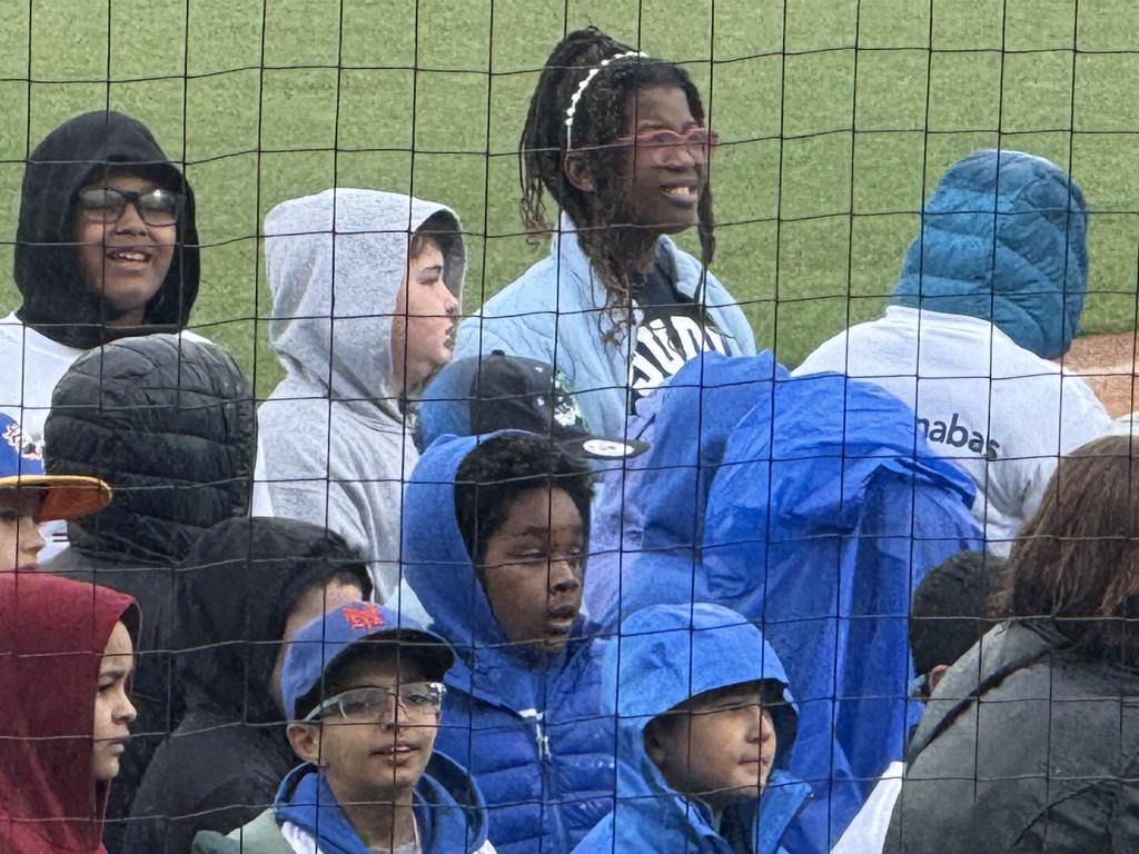 Students standing in Slightly rainy and cool day 