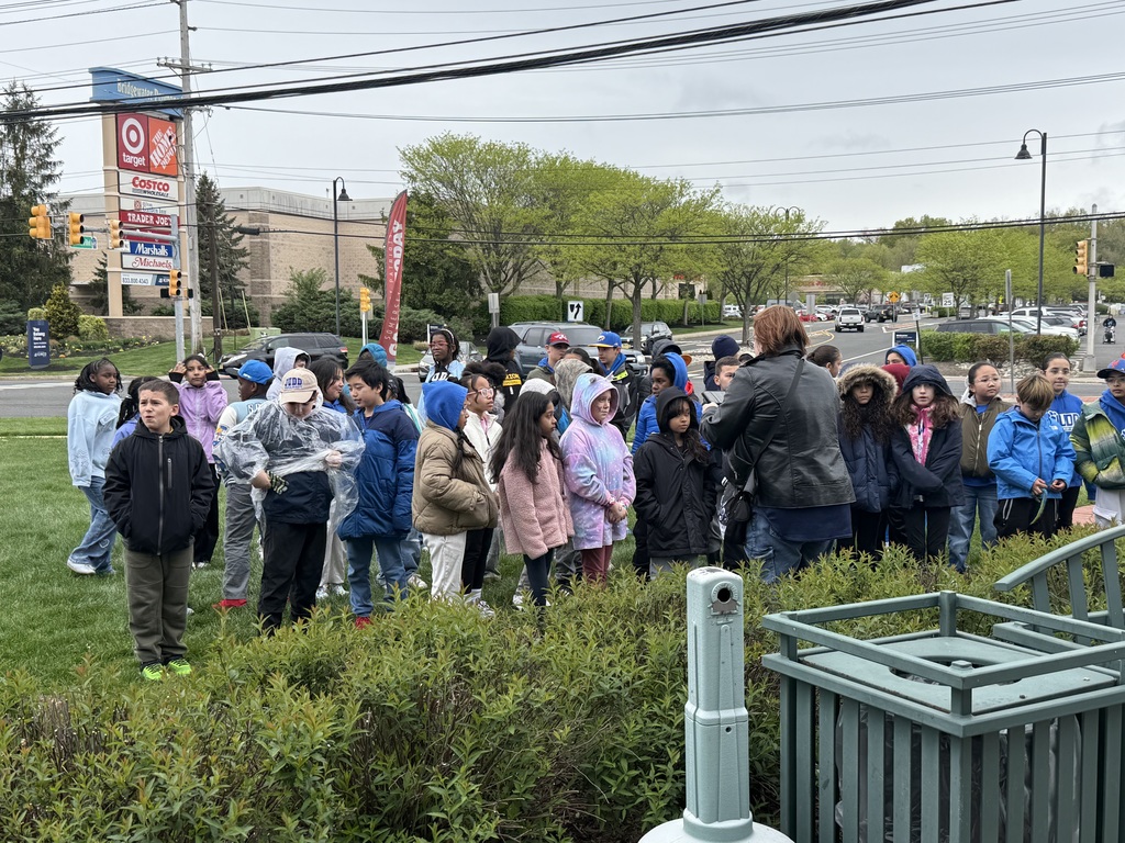 Students meeting at the flagpole 