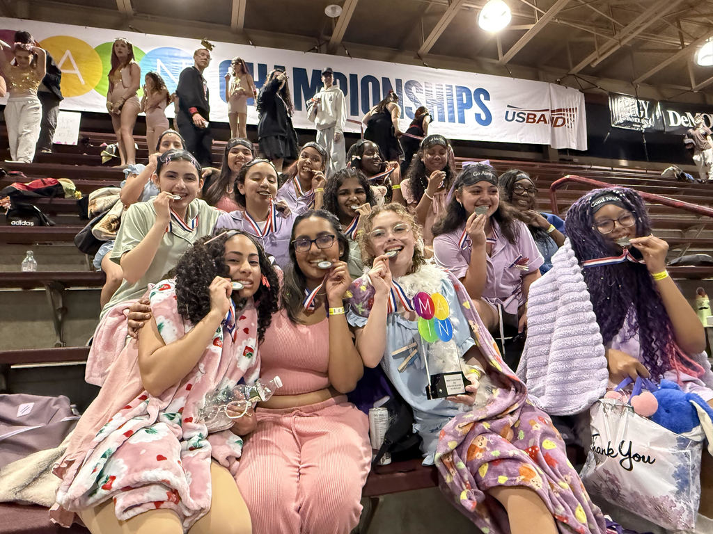The Winter Color Guard pose with their medals after coming in second place at the MAIN Indoor Color Guard Championship show.