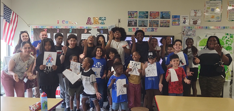 NBTHS mentors and Parsons Pride students pose for a picture together.