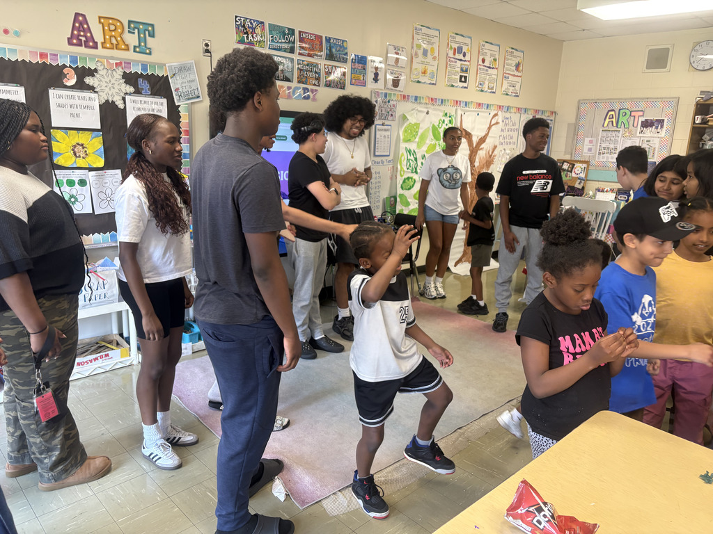 NBTHS mentors and Parsons Pride students pose for a picture together.