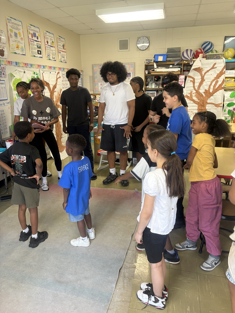 NBTHS mentors and Parsons Pride students pose for a picture together.