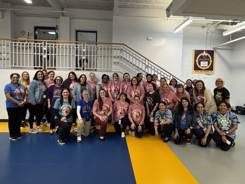 Staff posing together