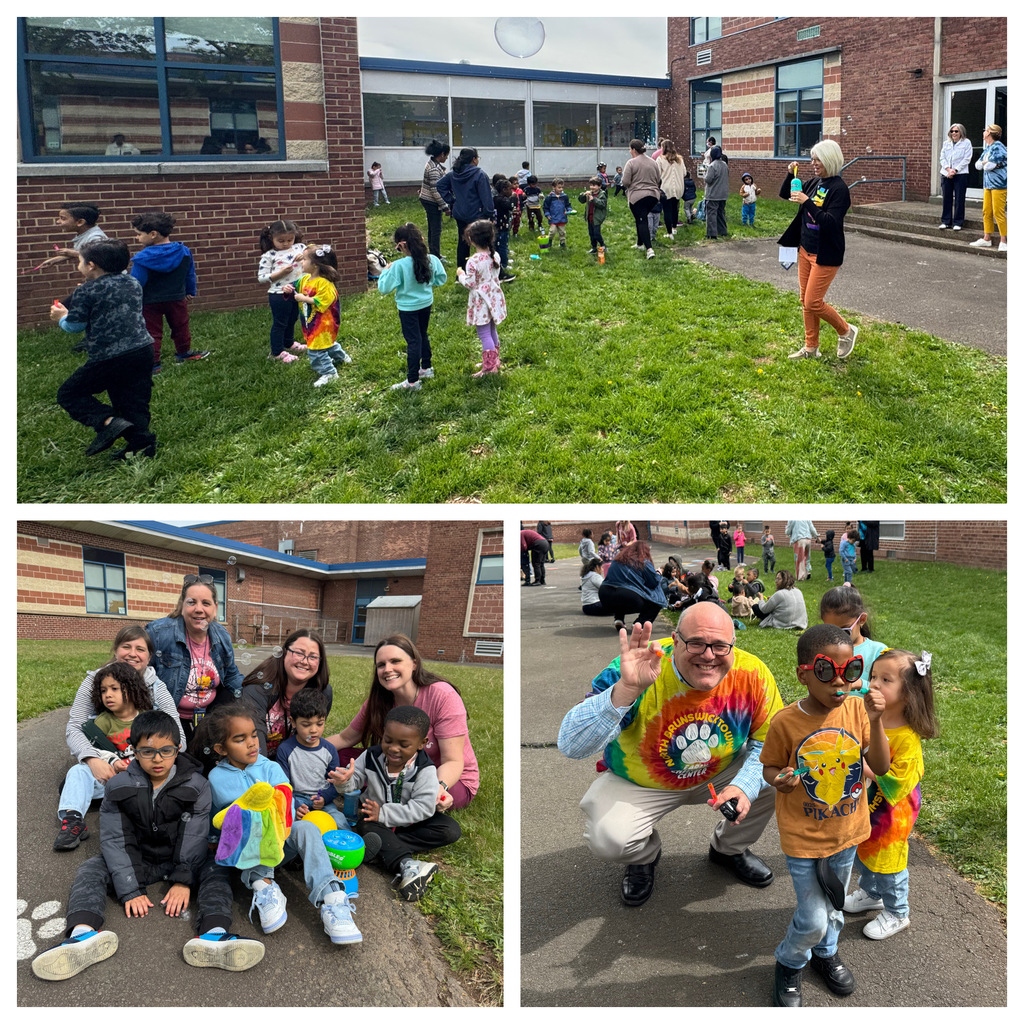 Kids posing with teachers